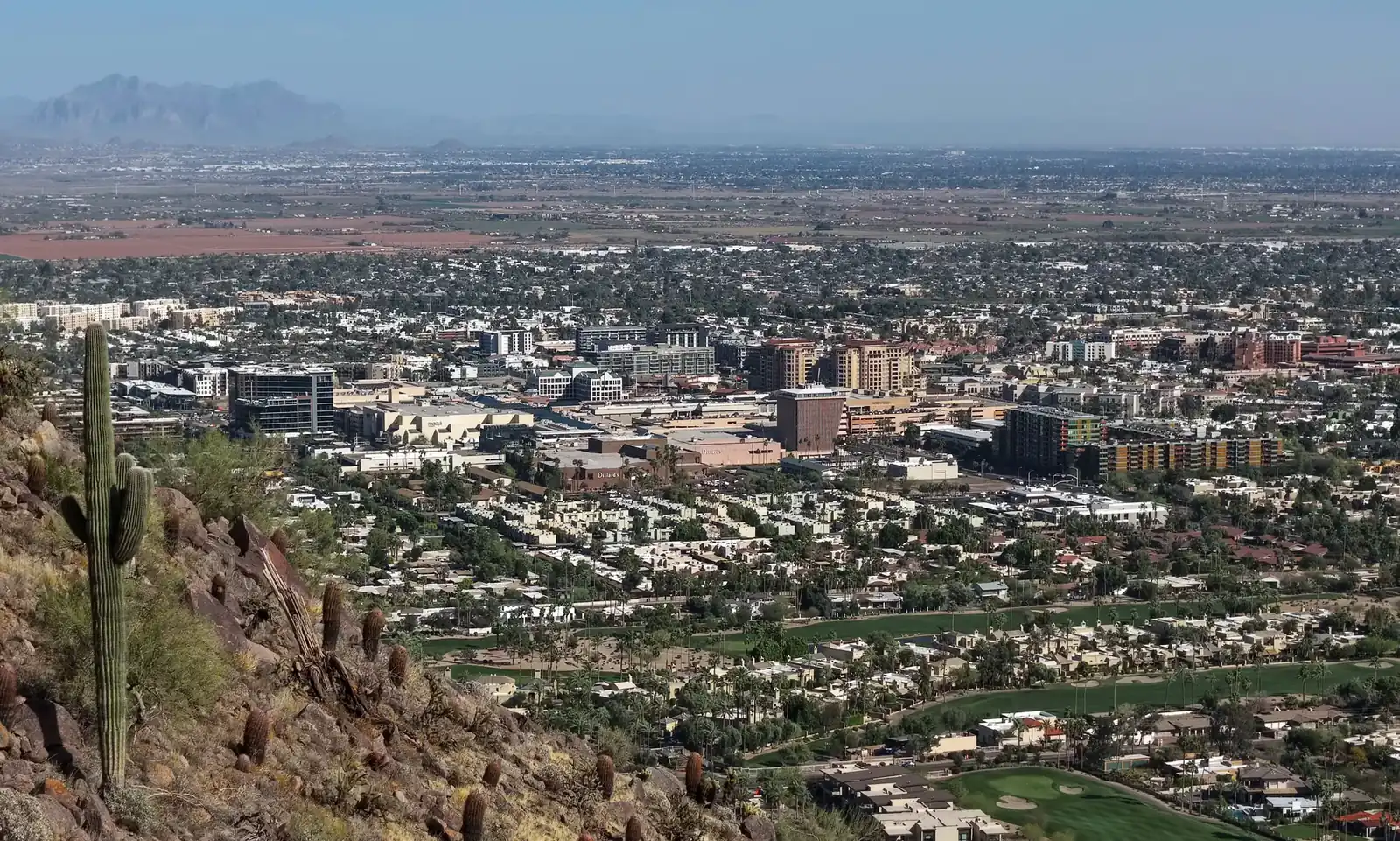 Aerial view of Scottsdale, Arizona with desert mountains in the distance